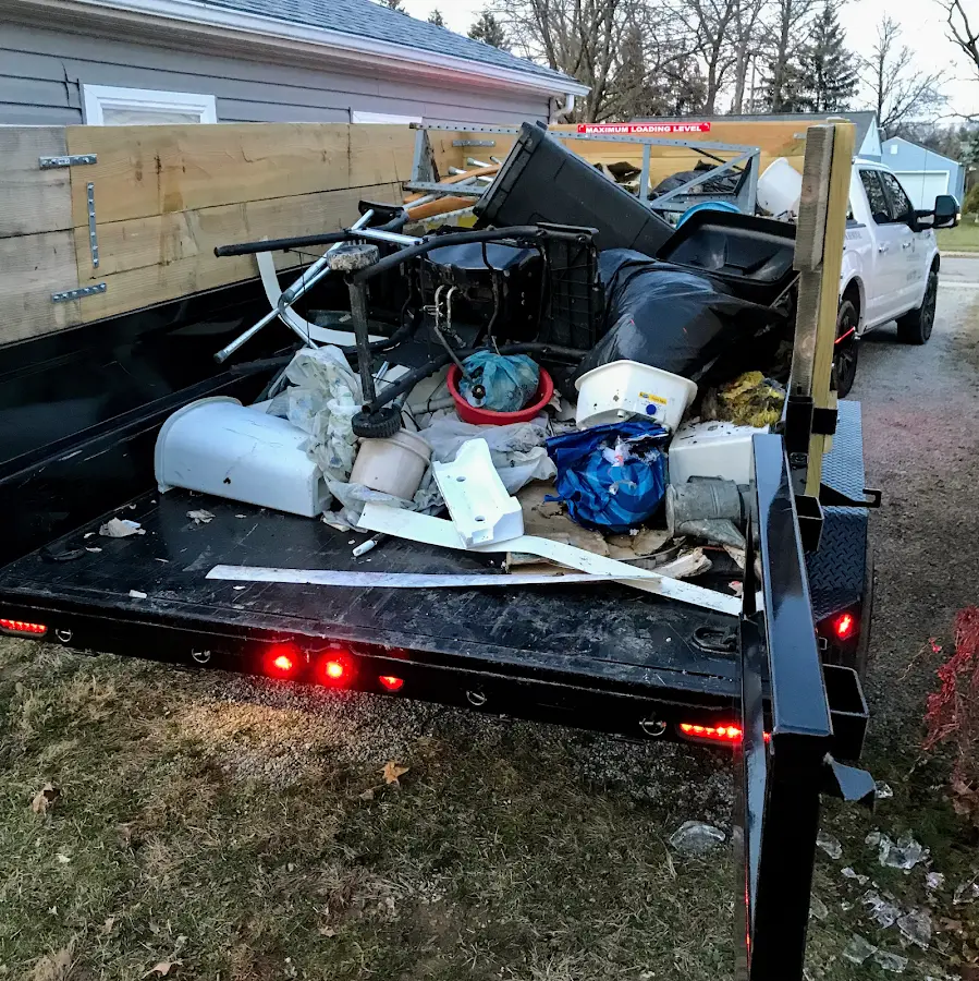 Roll-off dumpster delivered to a residential driveway in Muscoy